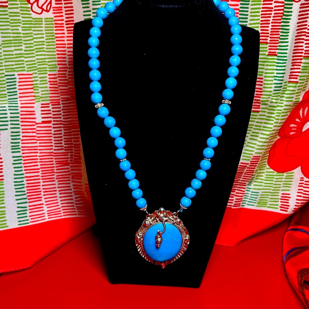 Turquoise colored stone necklace